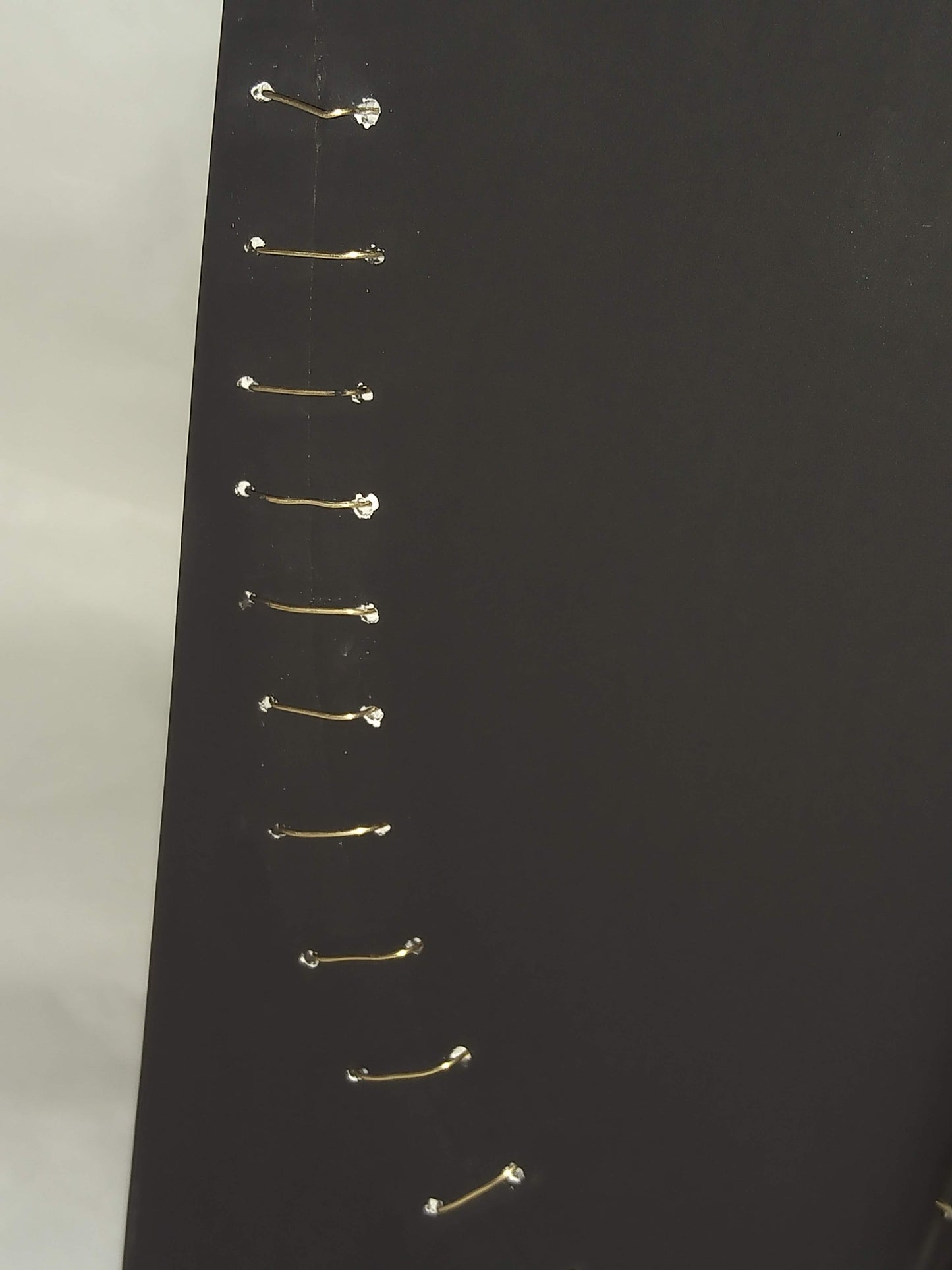 Beautifully Broken. Matte Black Wire Stitched Vase