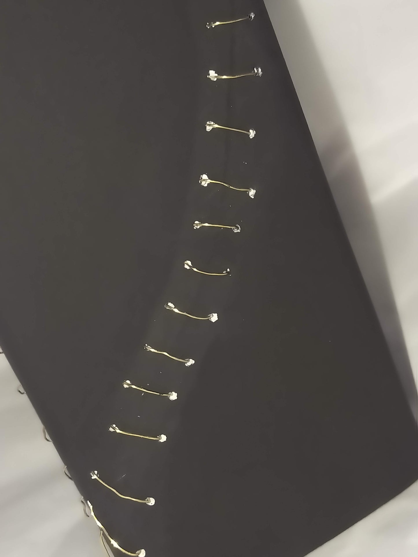 Beautifully Broken. Matte Black Wire Stitched Vase